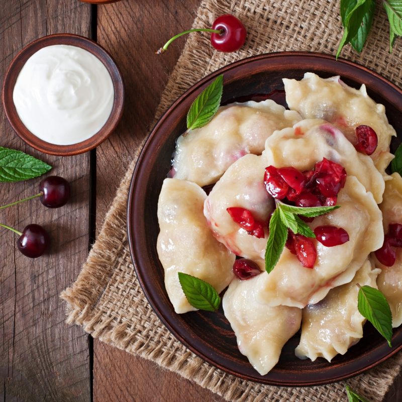 Delicious dumplings with cherries and jam.