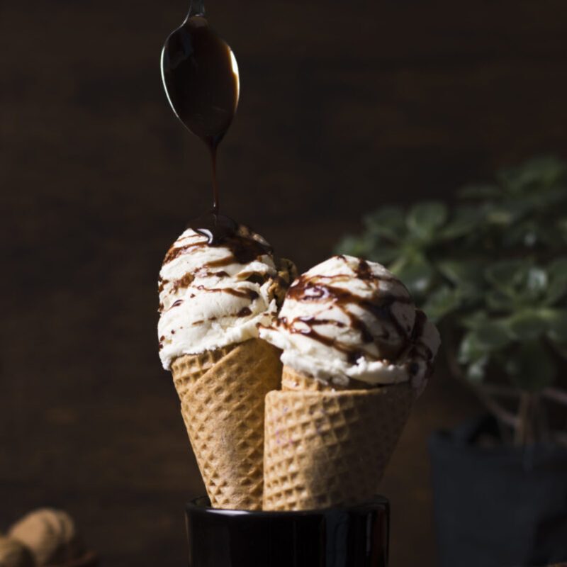 delicious-ice-cream-cones-with-caramel-topping